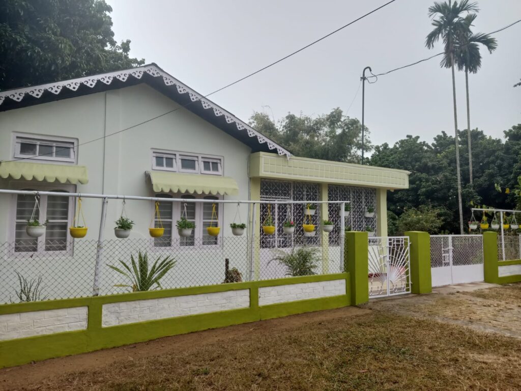 Goswami Eco Homestay Tezpur front view surrounded by greenery, a peaceful eco-friendly homestay in Tezpur