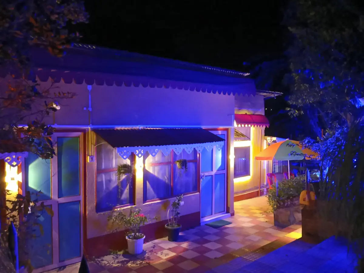 Exterior view of Goswami Eco Homestay, a peaceful Tezpur homestay surrounded by nature.